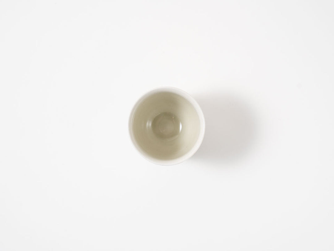 Carved Floral Iron-Glaze Teacup — Hand-Carved Japanese Porcelain by Madoka Suzuki