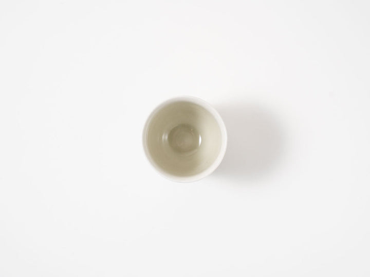 Carved Floral Iron-Glaze Teacup — Hand-Carved Japanese Porcelain by Madoka Suzuki