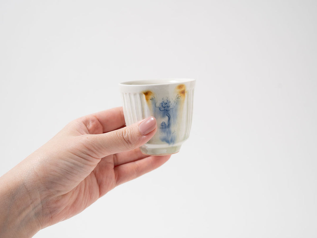 Carved Floral Iron-Glaze Teacup — Hand-Carved Japanese Porcelain by Madoka Suzuki