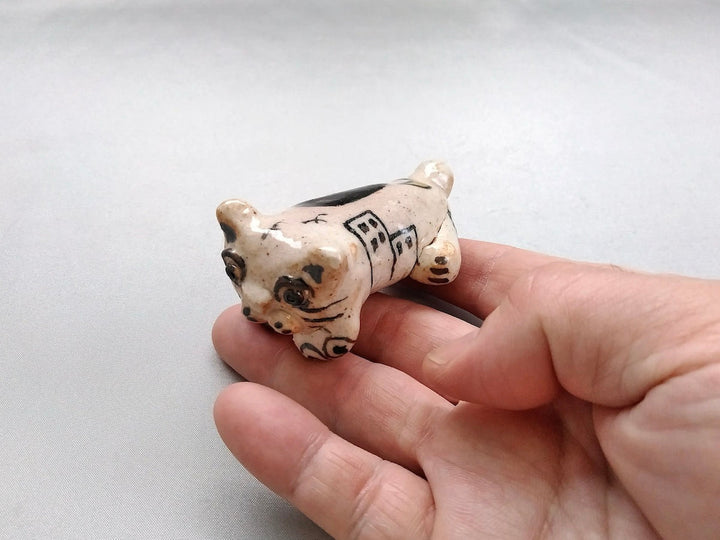 Small cat animal lying face down - Crafted By Hiroshi Sato